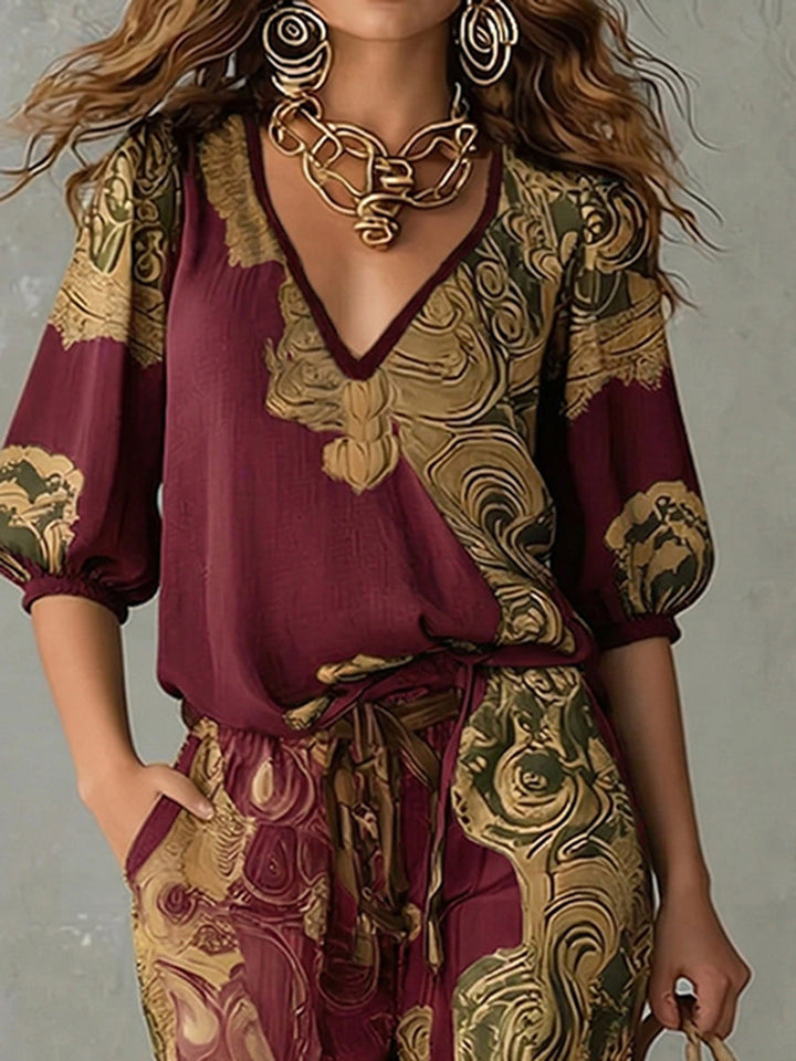 Flowy bohemian print matching set for women, including a half-sleeve v-neck top & wide-leg summer pants.