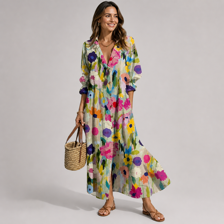 Vibrant Bohemian print maxi dress for women, with button-front & V-neck. Flowy long sleeve summer resort wear.