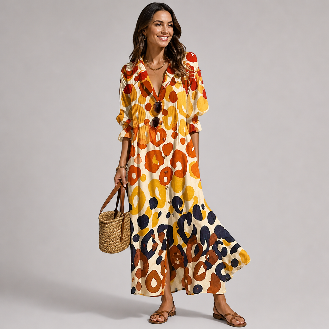 Elegant long sleeve women's maxi dress featuring a vibrant Bohemian print, button-front, & flattering V-neck.