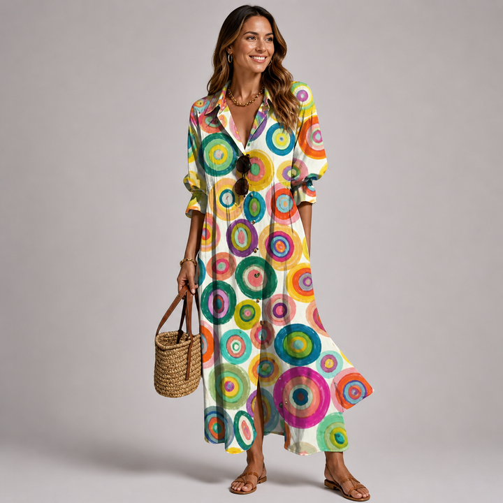 Stylish women's long dress: vibrant bohemian print, V-neck, button-front. Ideal as a flowy summer resort maxi.