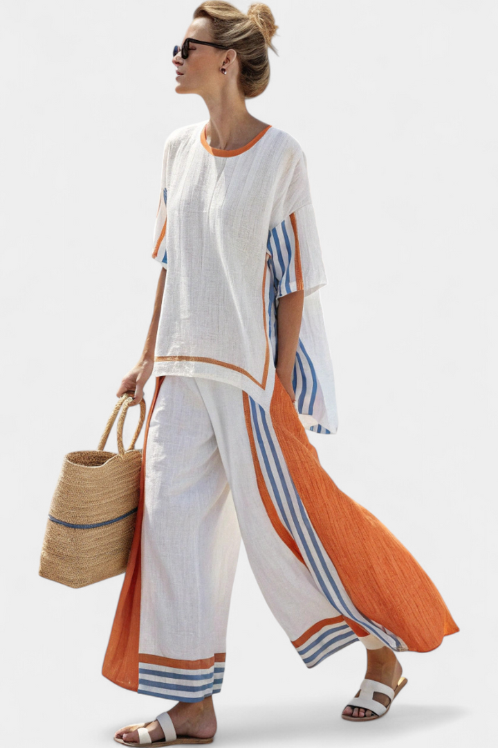 Women's bohemian striped two-piece lounge set with a relaxed tunic top & wide-leg pants for comfortable resort wear.