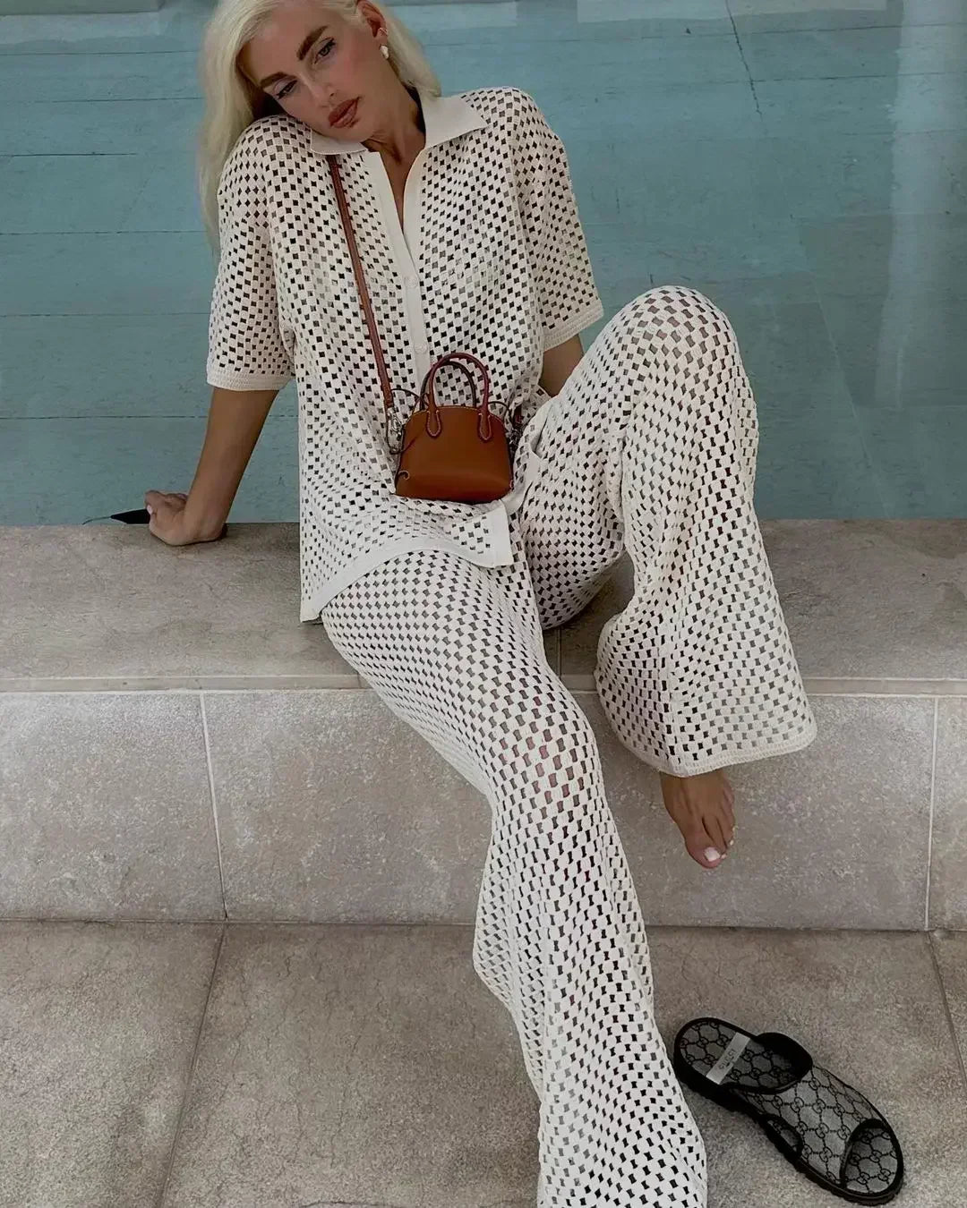 Stylish women's striped bohemian two-piece set, perfect as a lightweight summer outfit or beach lounge wear.