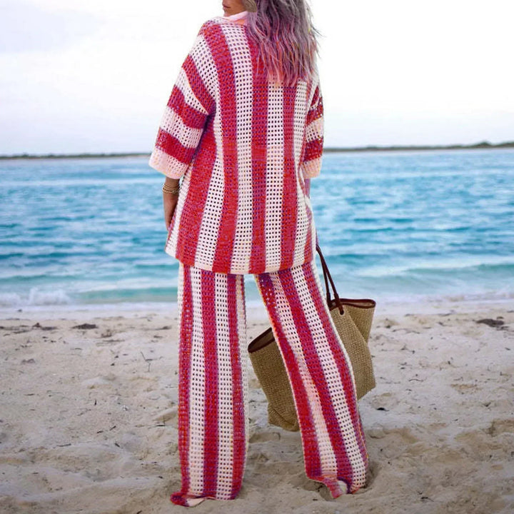 Casual women's striped two-piece summer set, featuring a boho top and matching pants for beach or resort.