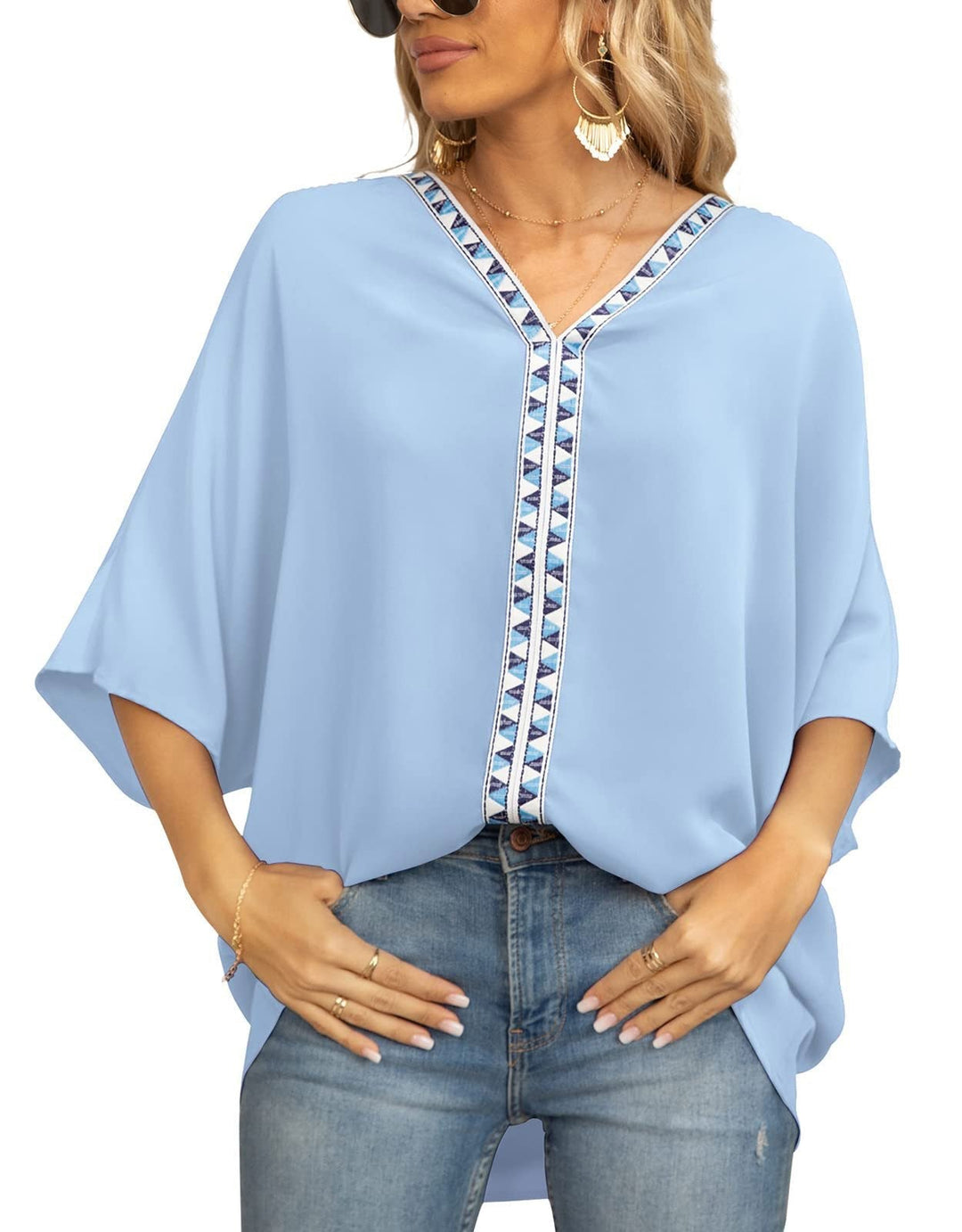 Embroidered V-neck bohemian tunic for women, comfortable loose fit and half sleeves.