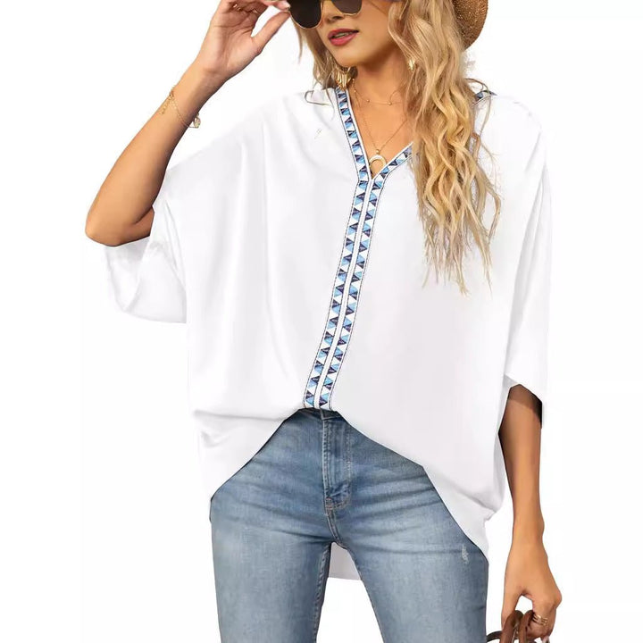 Spring style women's casual top, loose fit bohemian design with geometric V-neck trim.