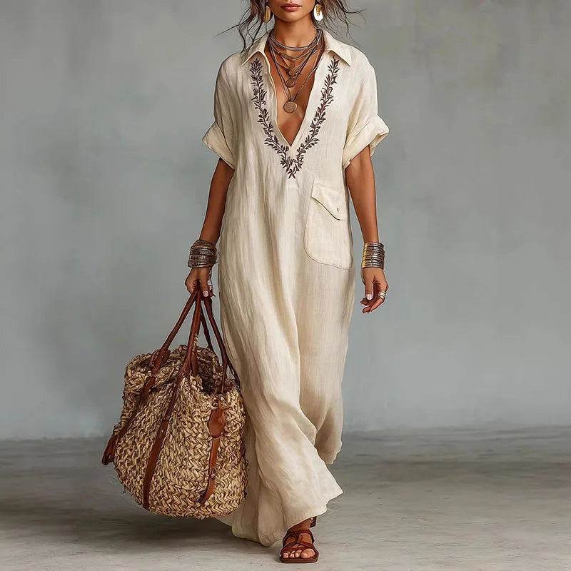 Women's Bohemian V-neck maxi dress with a flowing, relaxed fit. Perfect for summer fashion & casual chic.