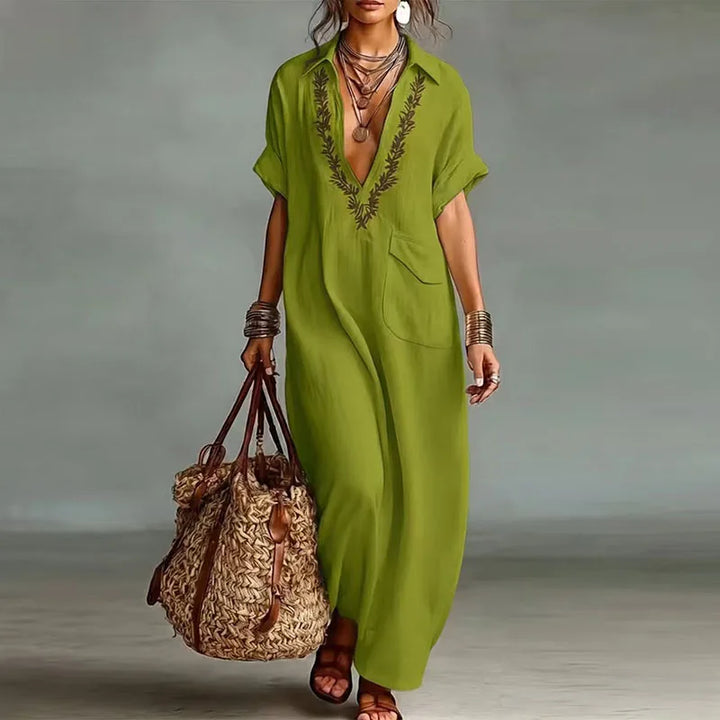 Printed women's V-neck maxi dress, a bohemian style for effortless summer fashion, vacation, or beach days.