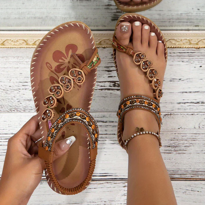Women's boho beach sandals for effortless summer style. Comfortable flat slip-on design.
