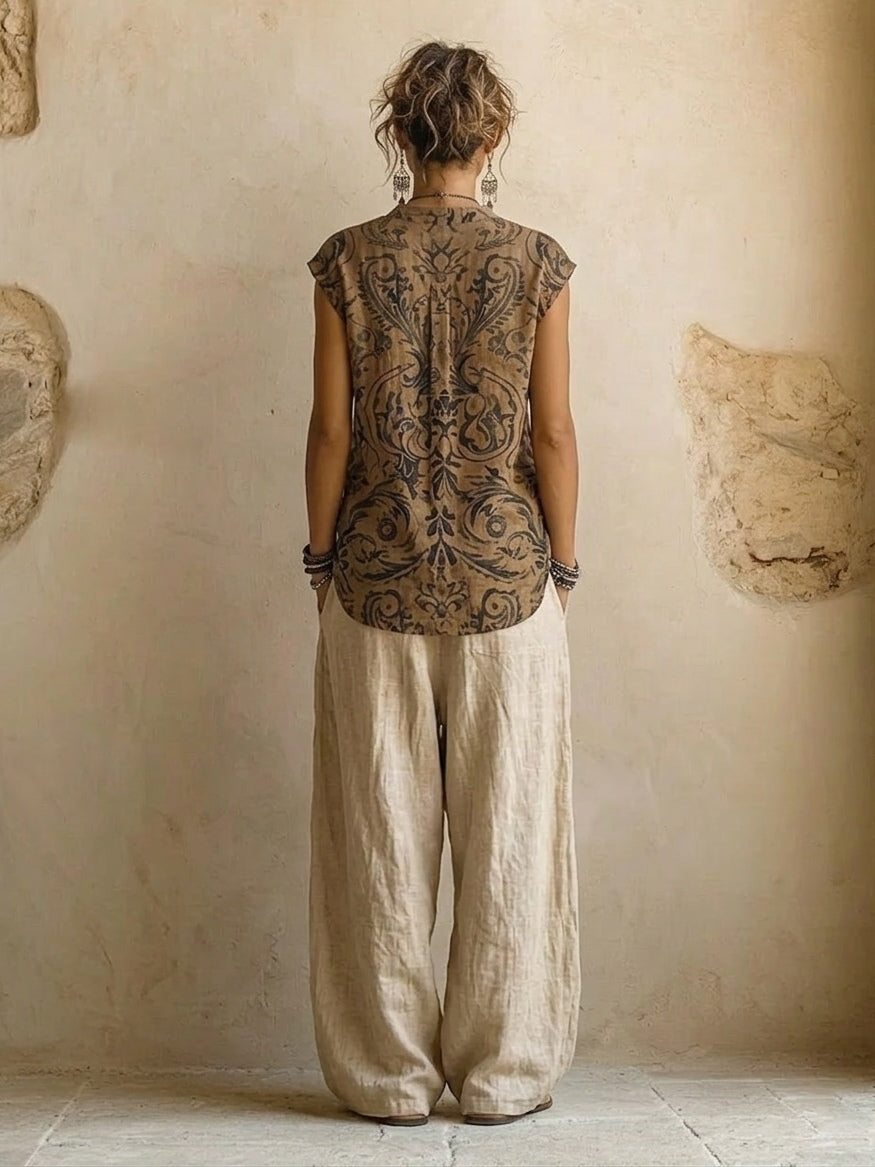 Elegant women's wide leg pants & matching top with a flowing bohemian print cardigan for a chic summer style.