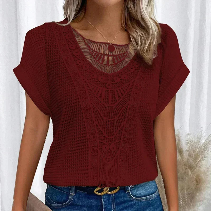 Fashionable women's short sleeve top showcasing elegant boho crochet, ideal for a relaxed, stylish outfit.
