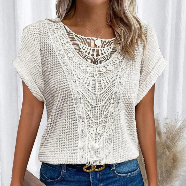 Women's relaxed fit top with bohemian crochet details, an essential for a comfortable, stylish summer.