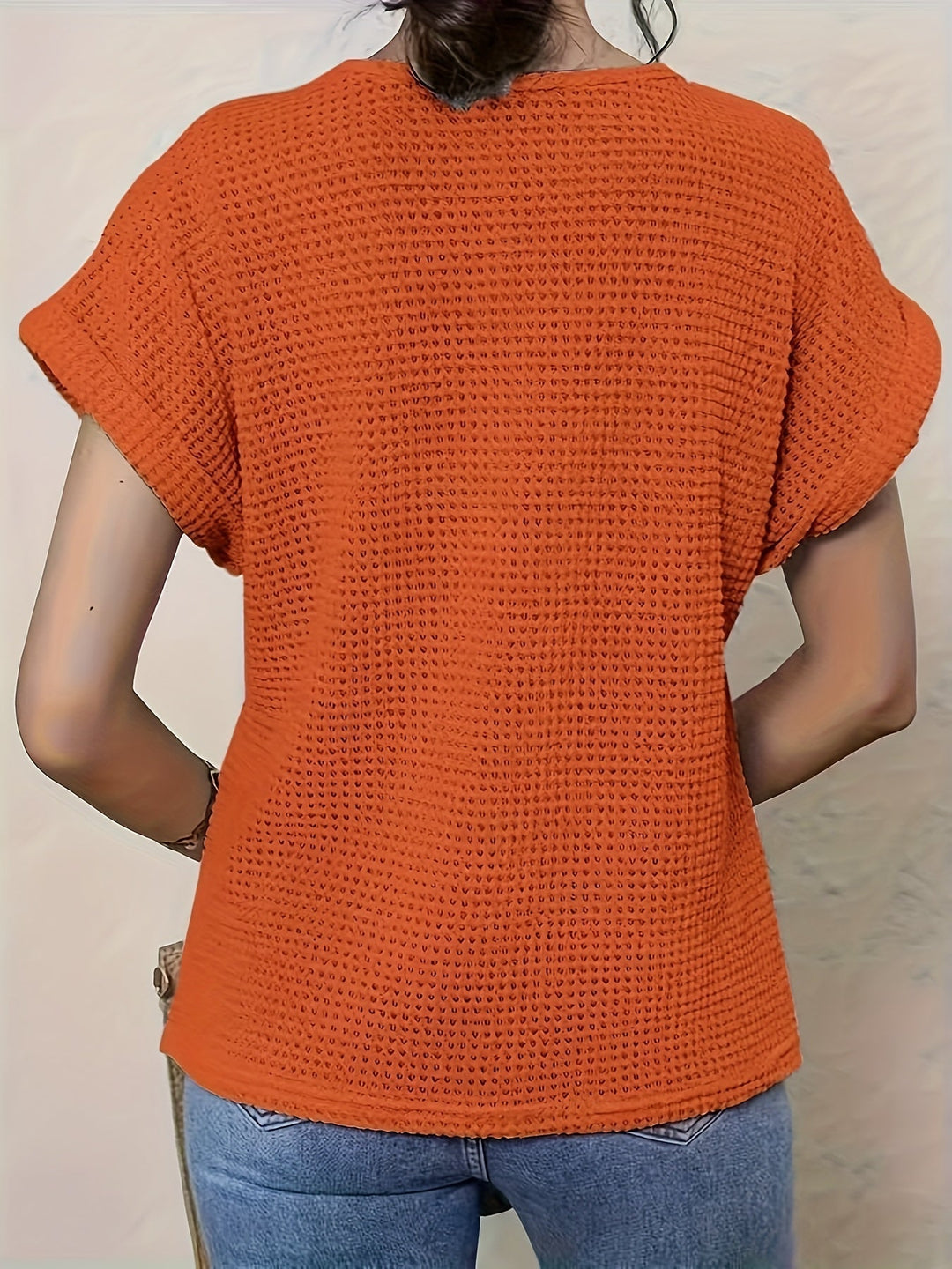 Chic women's bohemian top, featuring unique crochet detail and a comfortable relaxed fit for any season.