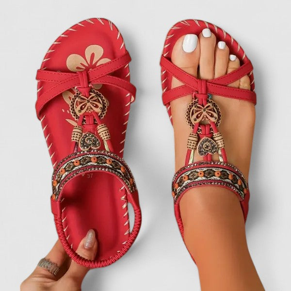 Women's boho flat sandals with colorful ethnic embroidery, perfect for summer casual wear.