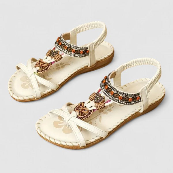 Bohemian women's flat sandals with intricate ethnic embroidery, ideal for summer vacation and comfort.