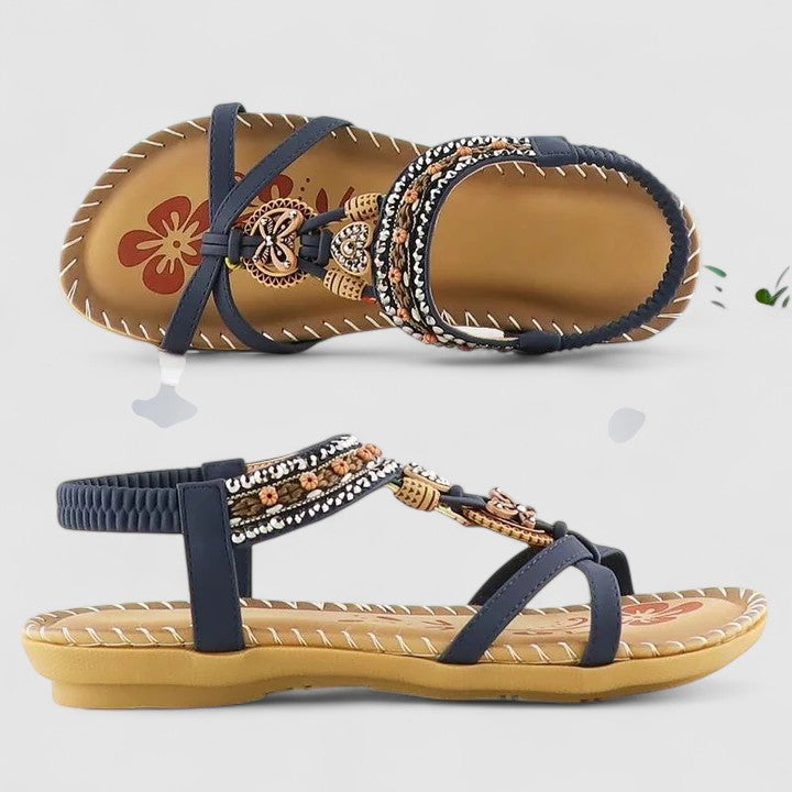 Boho embroidered women's flat sandals, chic ethnic design, perfect for warm weather and vacation.