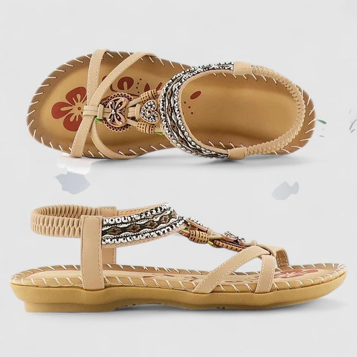 Vibrant embroidered boho flat sandals for women, comfortable and fashionable summer footwear.