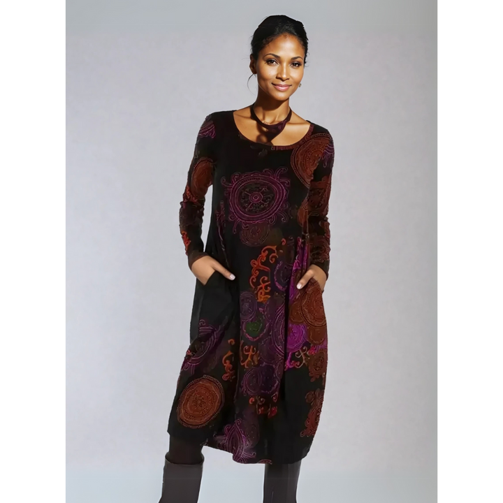 Vibrant floral print on a comfortable long sleeve midi dress for women, showcasing boho style.