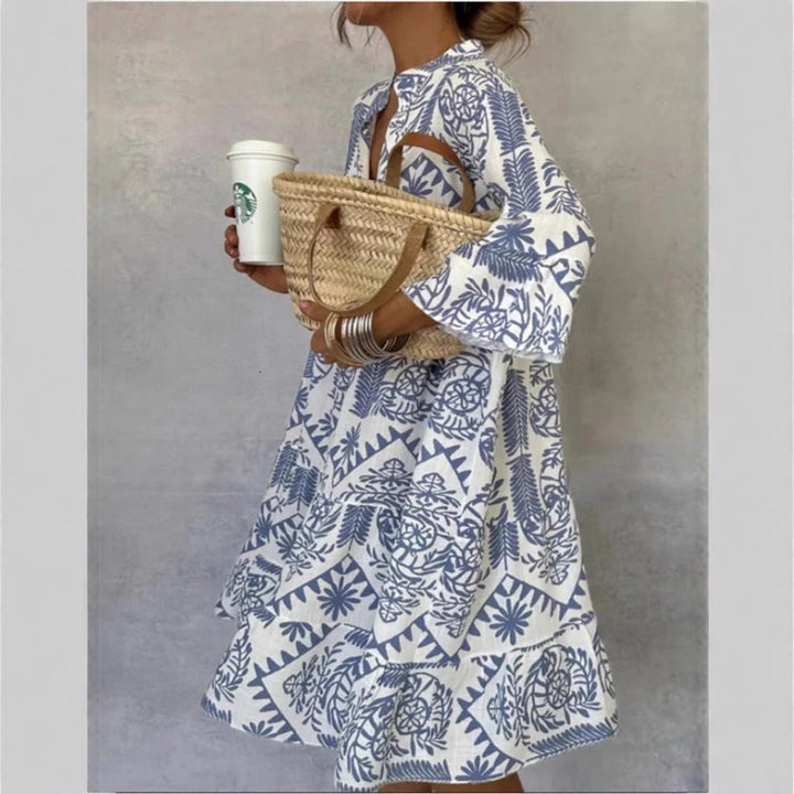 Women's boho floral sundress with tiered skirt, ideal for summer fashion & casual wear.