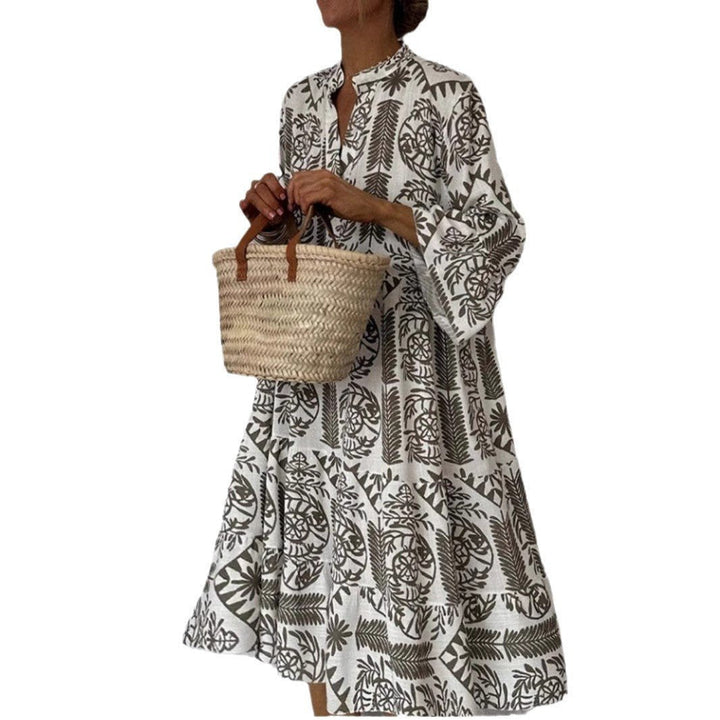 Effortless women's floral sundress with tiered skirt, perfect for summer, resort, or casual wear.