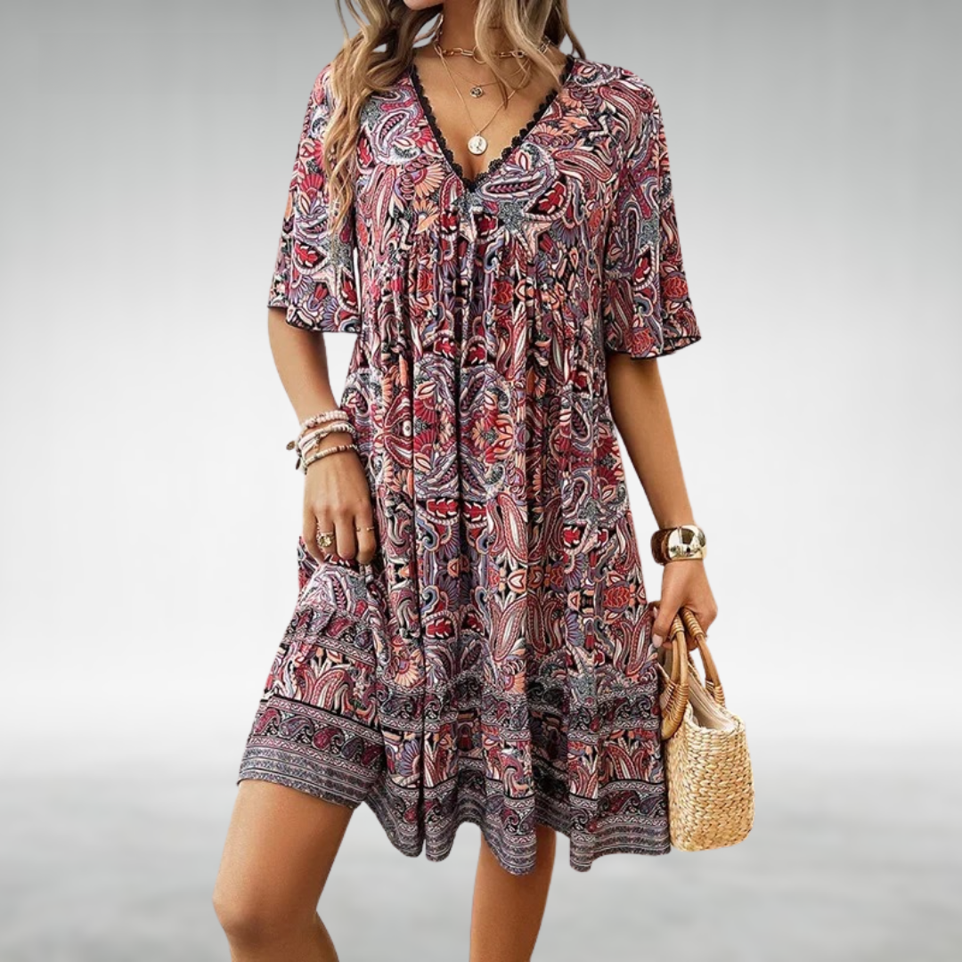 Comfortable women's boho mini dress with a beautiful paisley pattern, short sleeves & a relaxed summer fit.