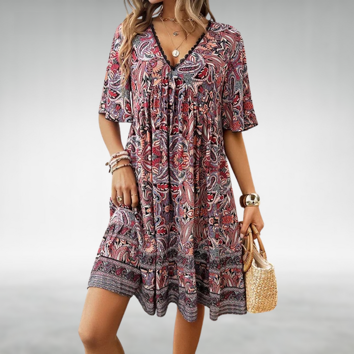 Comfortable women's boho mini dress with a beautiful paisley pattern, short sleeves & a relaxed summer fit.