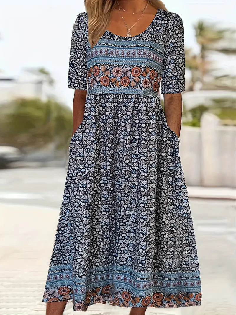 Flowy bohemian women's midi dress featuring a vibrant print, short sleeves, and a comfortable round neck.