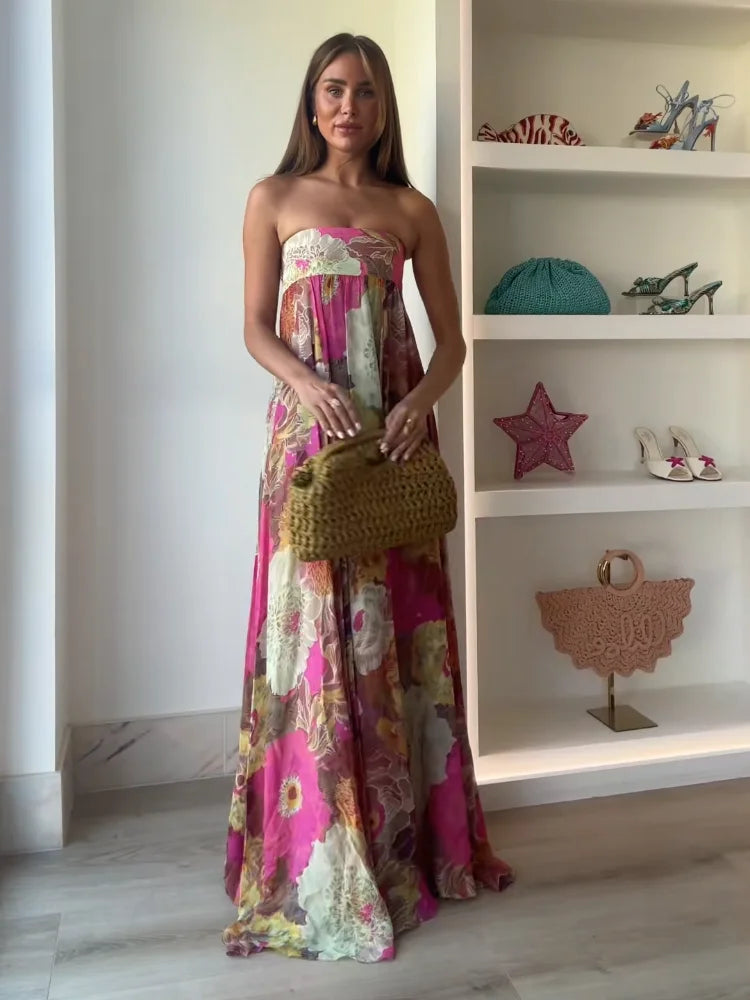 Statement women's strapless floral maxi dress, an empire waist design ideal for formal occasions & summer.