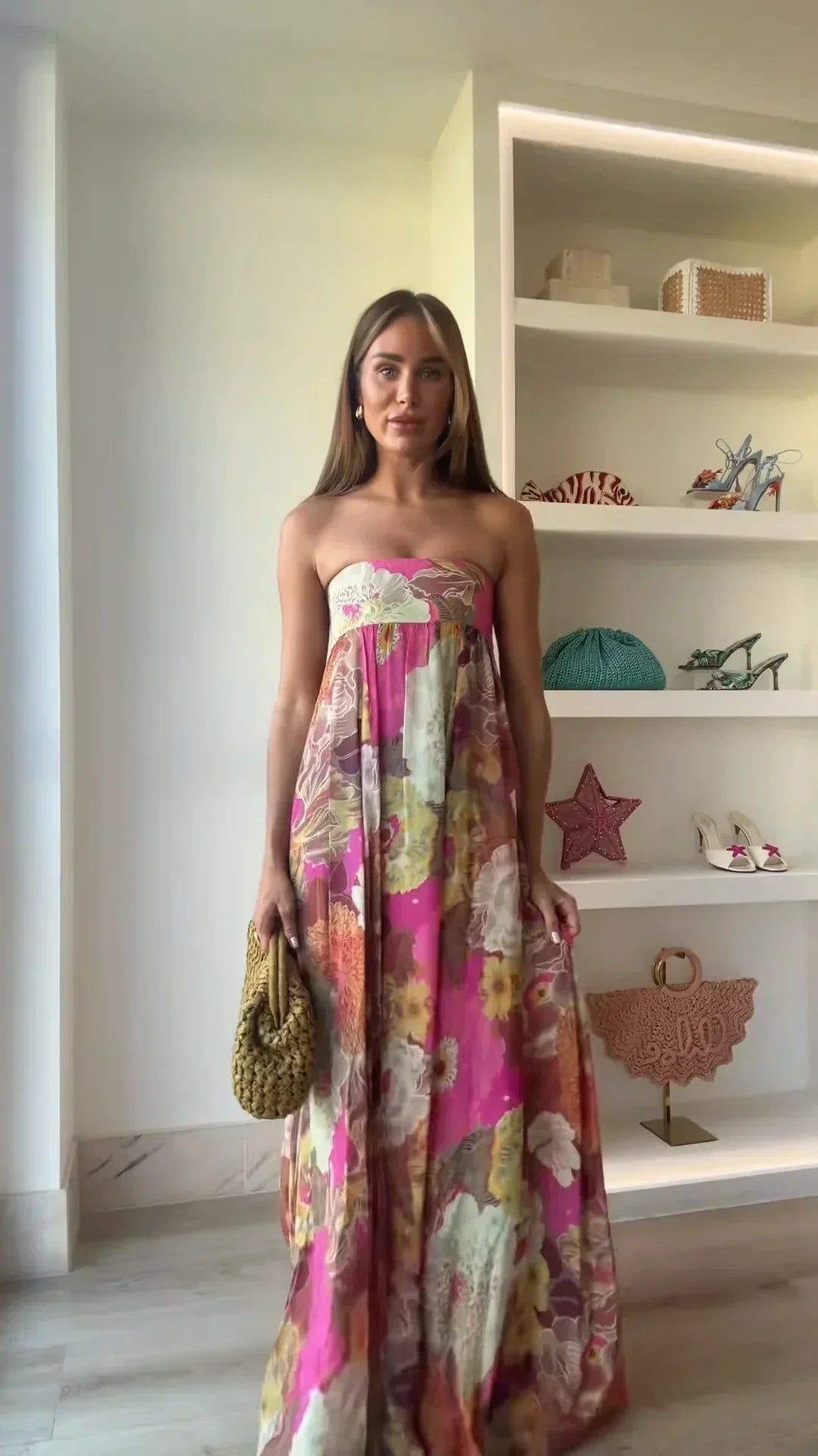 Flowy women's summer strapless maxi dress with a vibrant floral print & flattering empire waist silhouette.