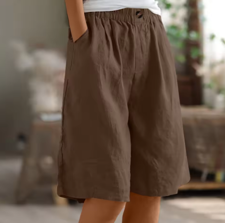 Relaxed fit women's workout shorts, breathable and comfortable for gym, running & casual wear.
