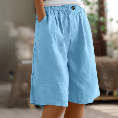 Moisture-wicking women's gym shorts, breathable for intense workouts, running & comfort.