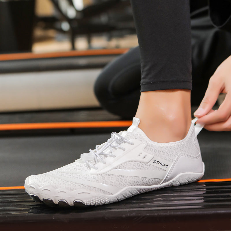 Lightweight women's zero drop athletic footwear with flexible sole for walking.