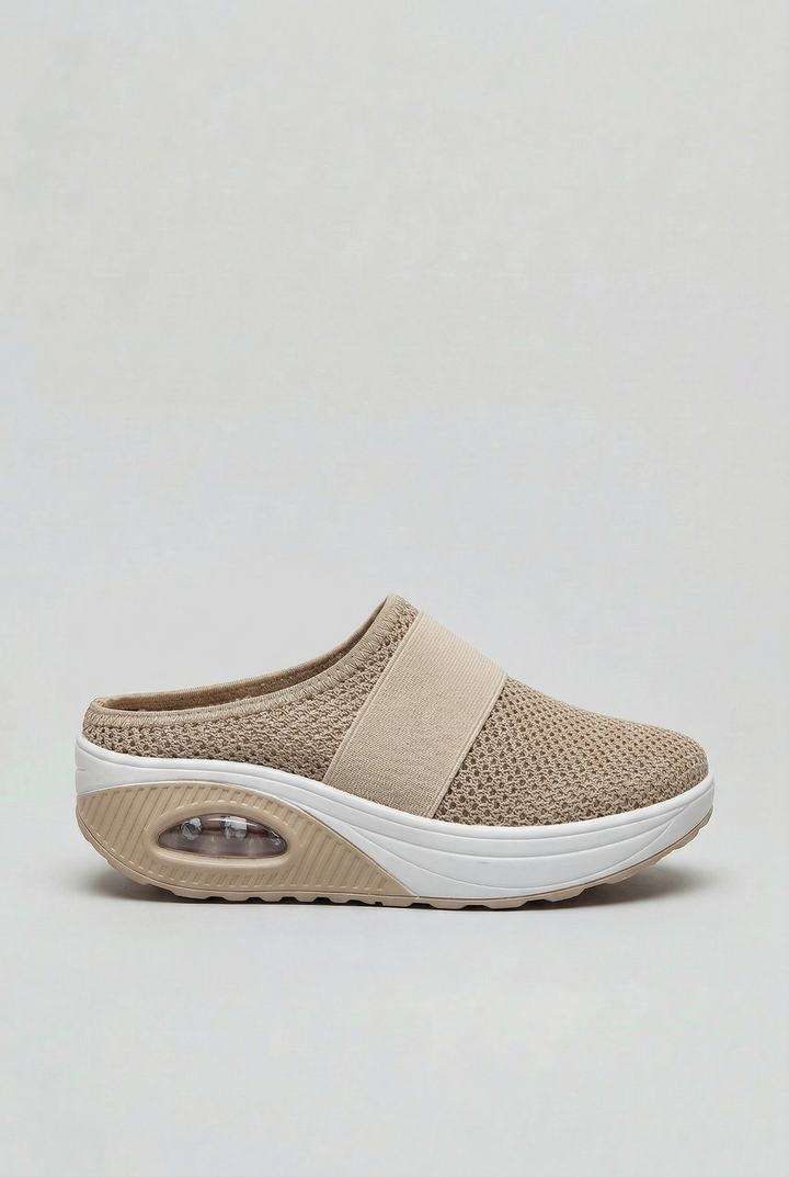 Women's breathable comfort mules with air cushion sole, ideal for lightweight, everyday casual footwear.