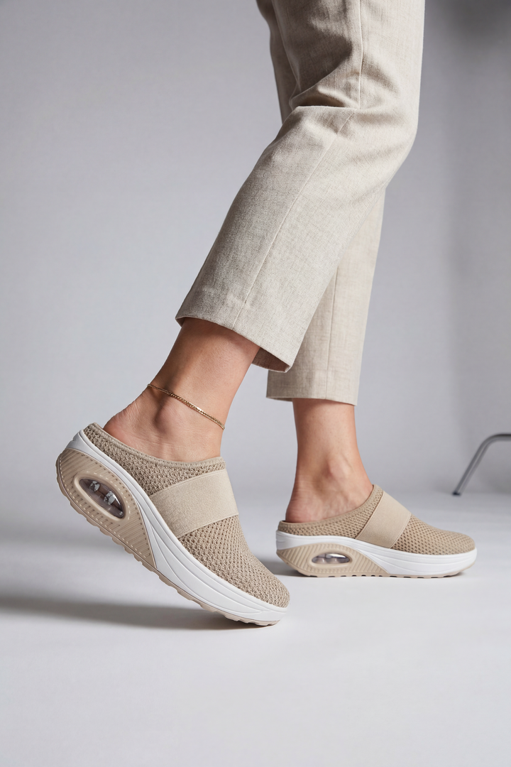 Slip-on women's mules, breathable & lightweight, perfect for casual summer style with an open back design.