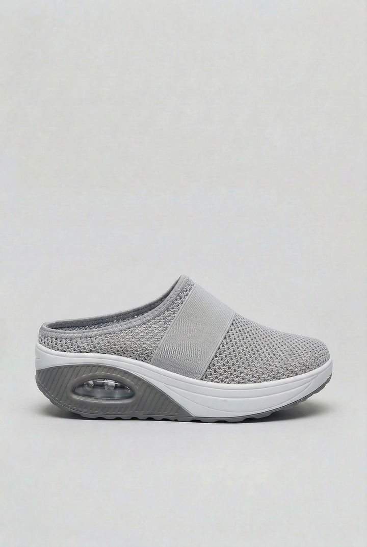Breathable women's comfort mules, open-back slip-ons with air cushion sole for ultimate lightweight casual style.