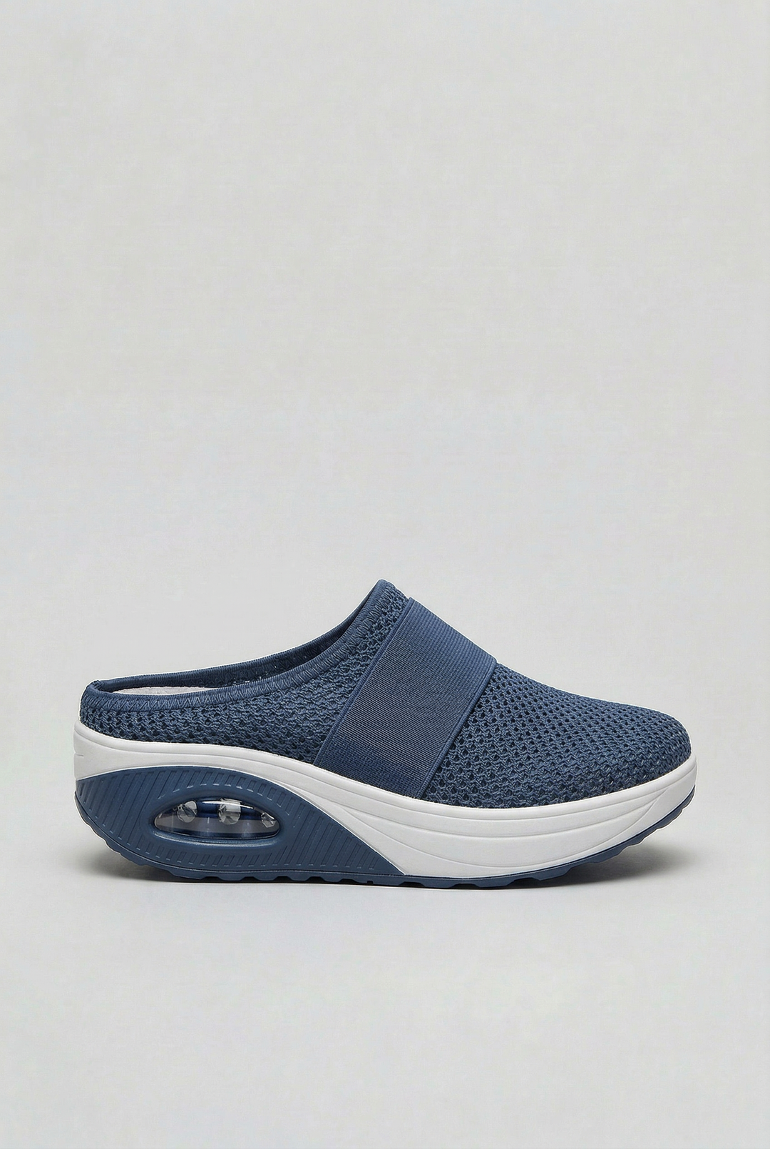 Stylish women's open-back mules, breathable and lightweight with an air cushion sole, perfect for summer comfort.