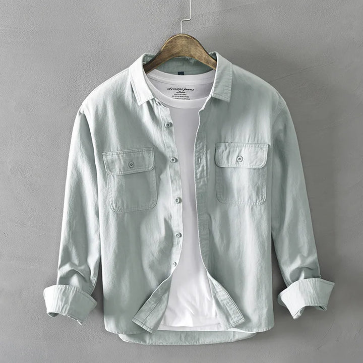 Relaxed fit women's breathable cotton shirt, capri-length sleeves, a versatile summer top.