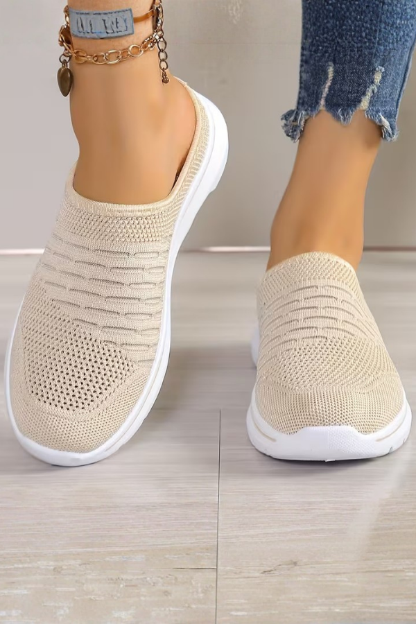 Close-up of women's platform mule slip-on shoe, highlighting breathable material & comfortable design for daily wear.