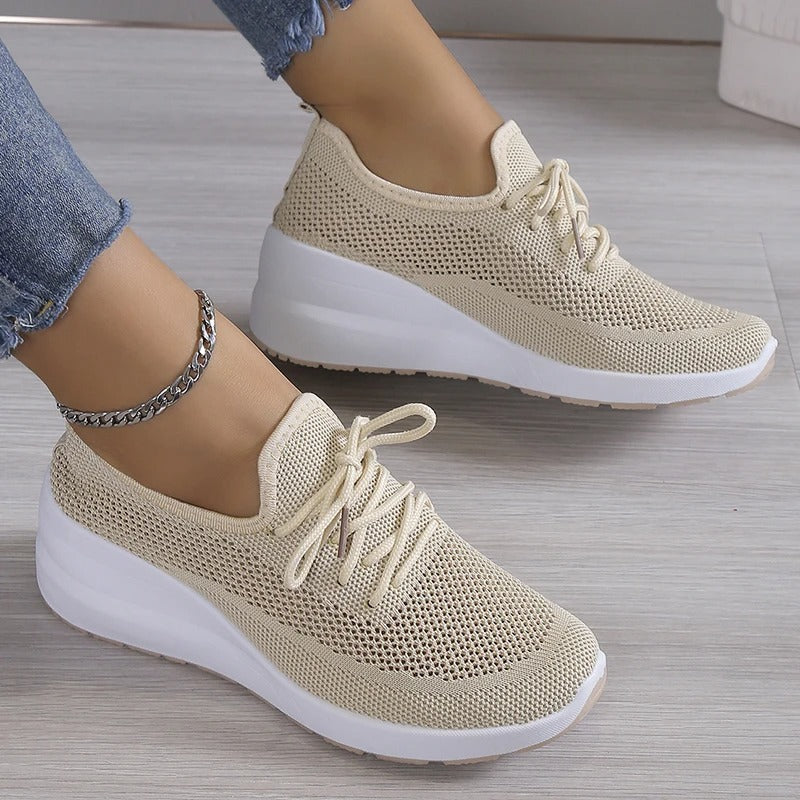 Women's breathable platform wedge sneakers for elevated comfort & everyday walking. Modern fashion footwear.