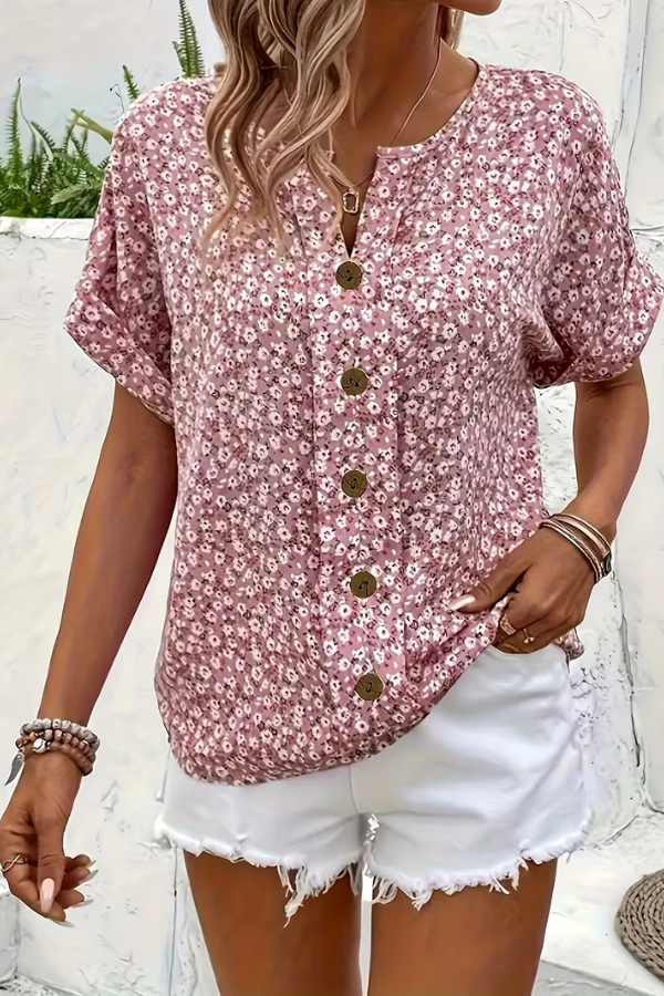 Versatile women's floral summer blouse, relaxed fit, ideal for casual everyday elegance or vacation.