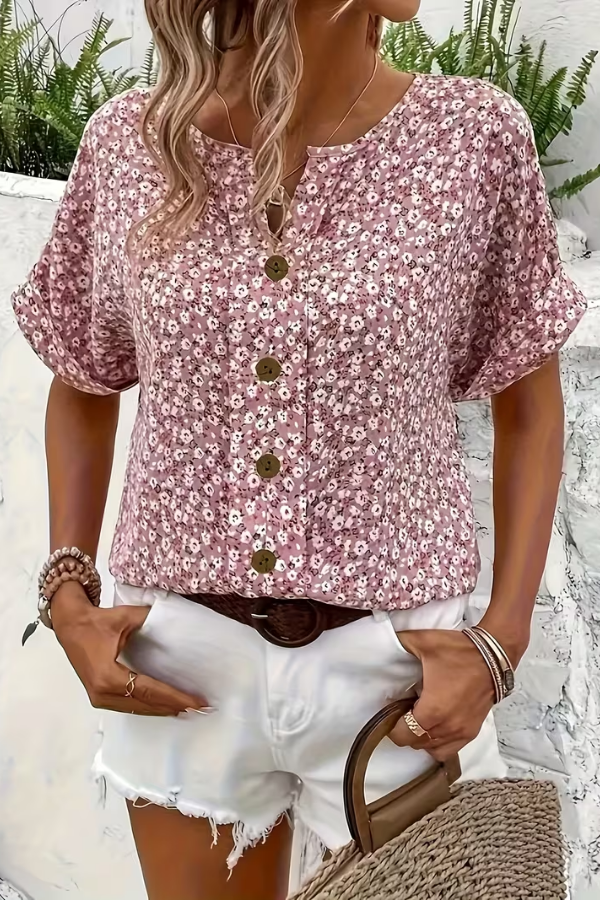 Lightweight women's floral blouse with short sleeves, breezy and comfortable, a stylish summer top.