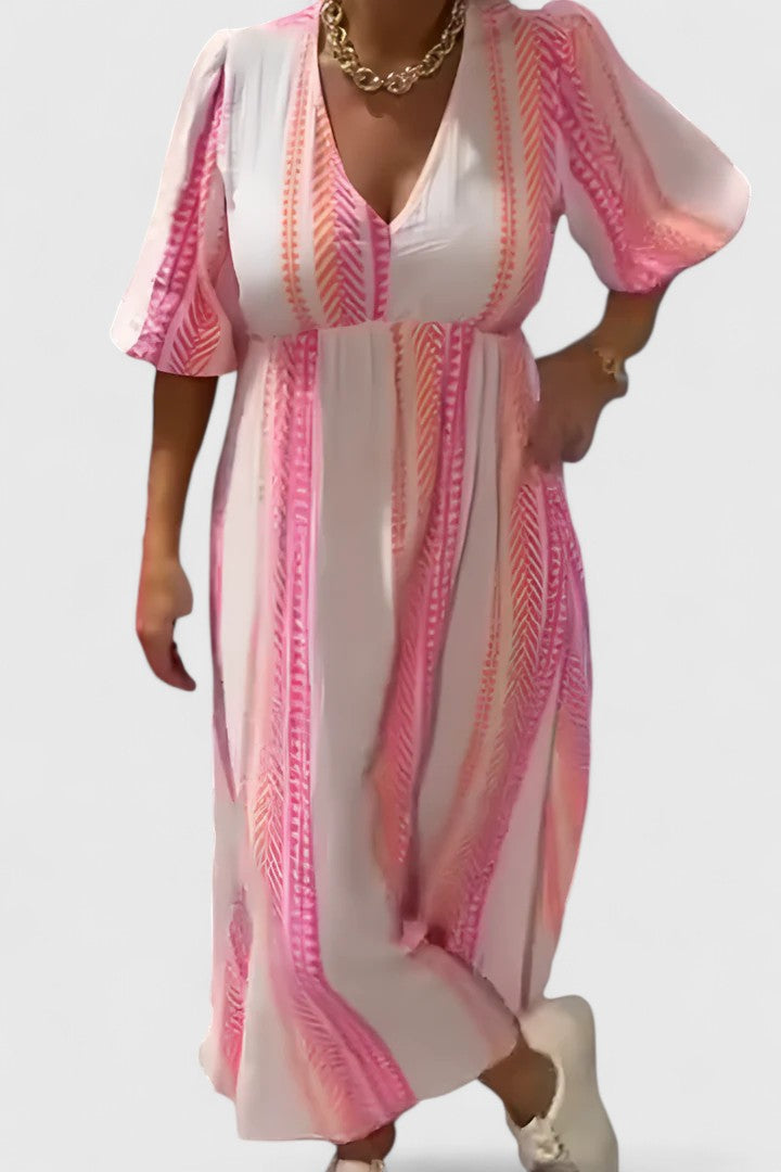 Women's breezy tropical stripe V-neck maxi dress with flattering puff sleeves, ideal for summer resort wear.