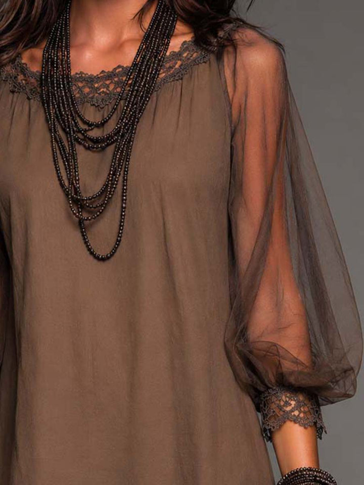 Bohemian brown mini dress for women, featuring sheer long sleeves & intricate crochet hem, ideal vacation outfit.