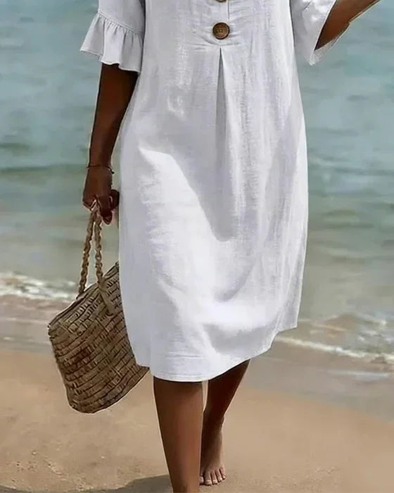 Feminine women's midi dress with ruffle sleeves, button front, great for casual summer fashion.