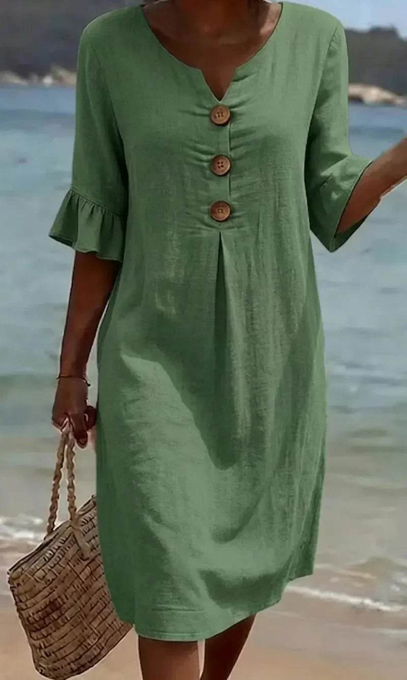 Stylish women's summer midi dress, comfortable relaxed fit, button front & delicate ruffle sleeves.