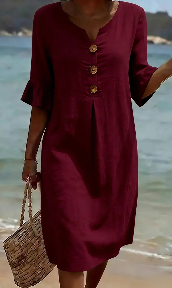 Chic women's midi dress with ruffle sleeves, button front, a flowy casual summer fashion essential.