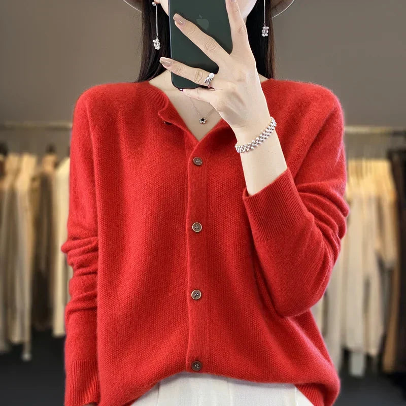 Fashionable women's button front knit cardigan. Cozy, long sleeve, round neck. Elegant fall & winter style.