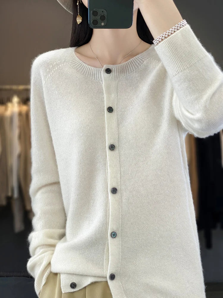 Soft & cozy women's knitwear cardigan, button front, long sleeve. Round neck layering top for comfort.