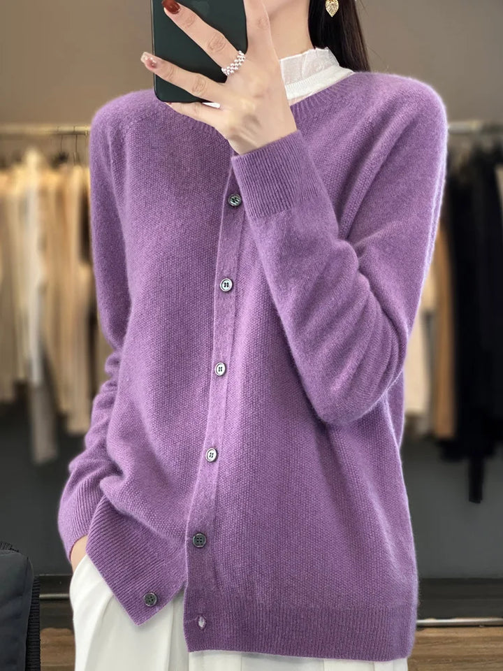 Stylish women's button front knit cardigan with round neck & long sleeves. A chic versatile layering top.