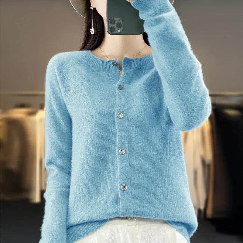 Women's versatile layering top: button front knit cardigan. Long sleeve, round neck for everyday style.