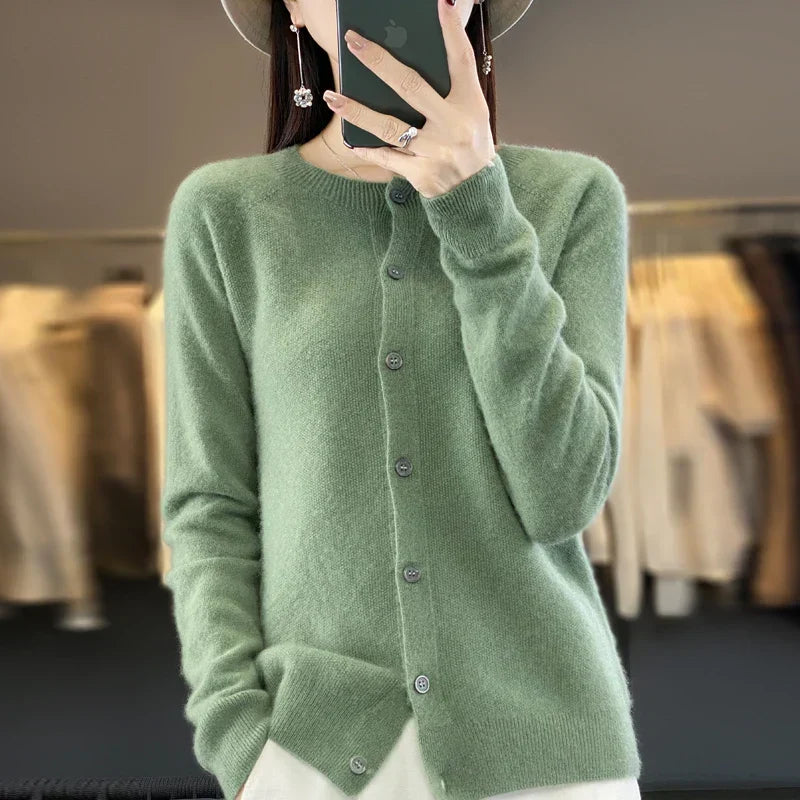 Casual chic women's long sleeve knit cardigan. Button front, round neck. Versatile for fall & spring.